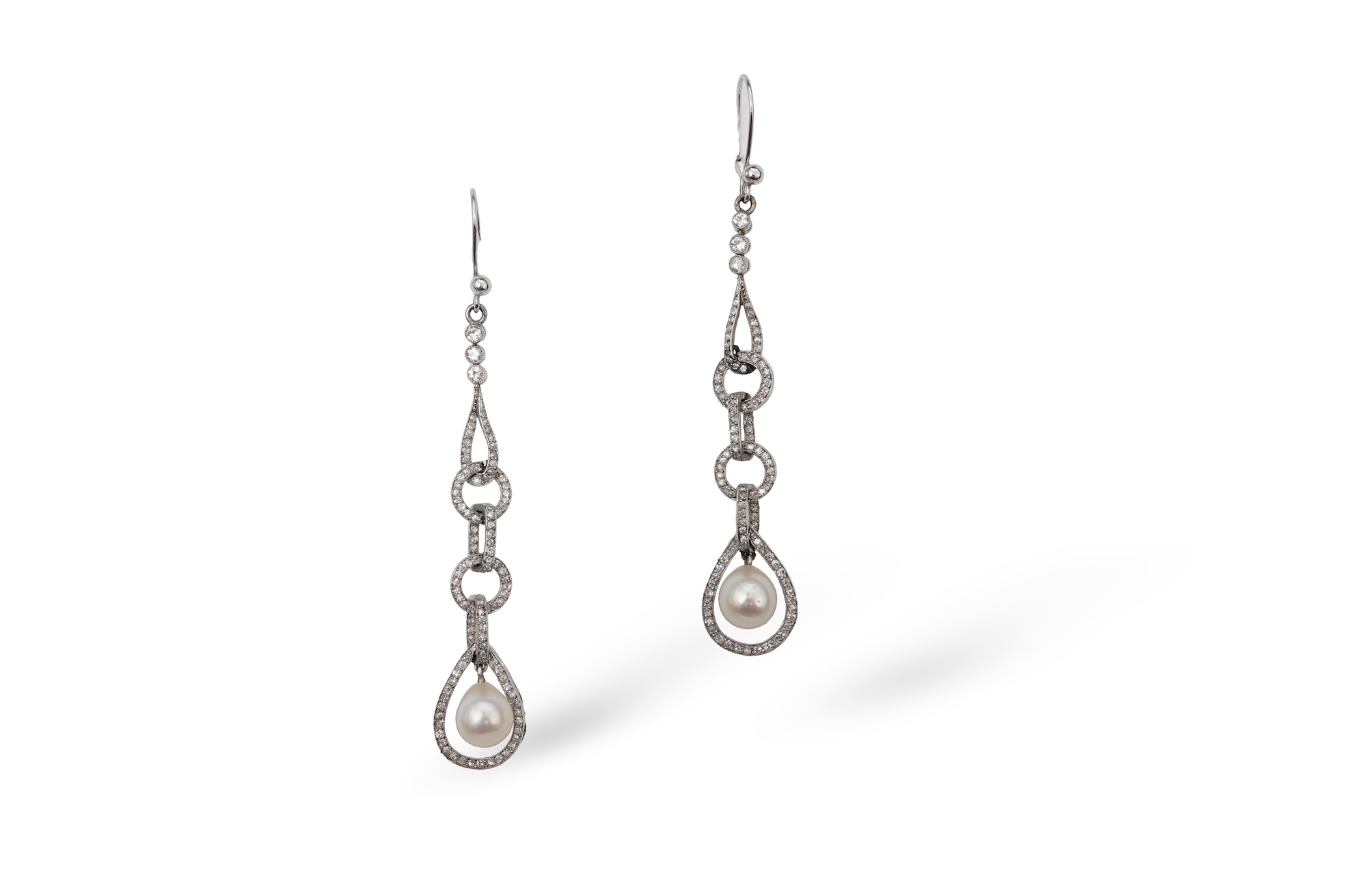 Attributed to Maurice Robin & Cie, a fine and rare pair of Art Deco natural pearl and diamond earrings, Paris, circa 1920